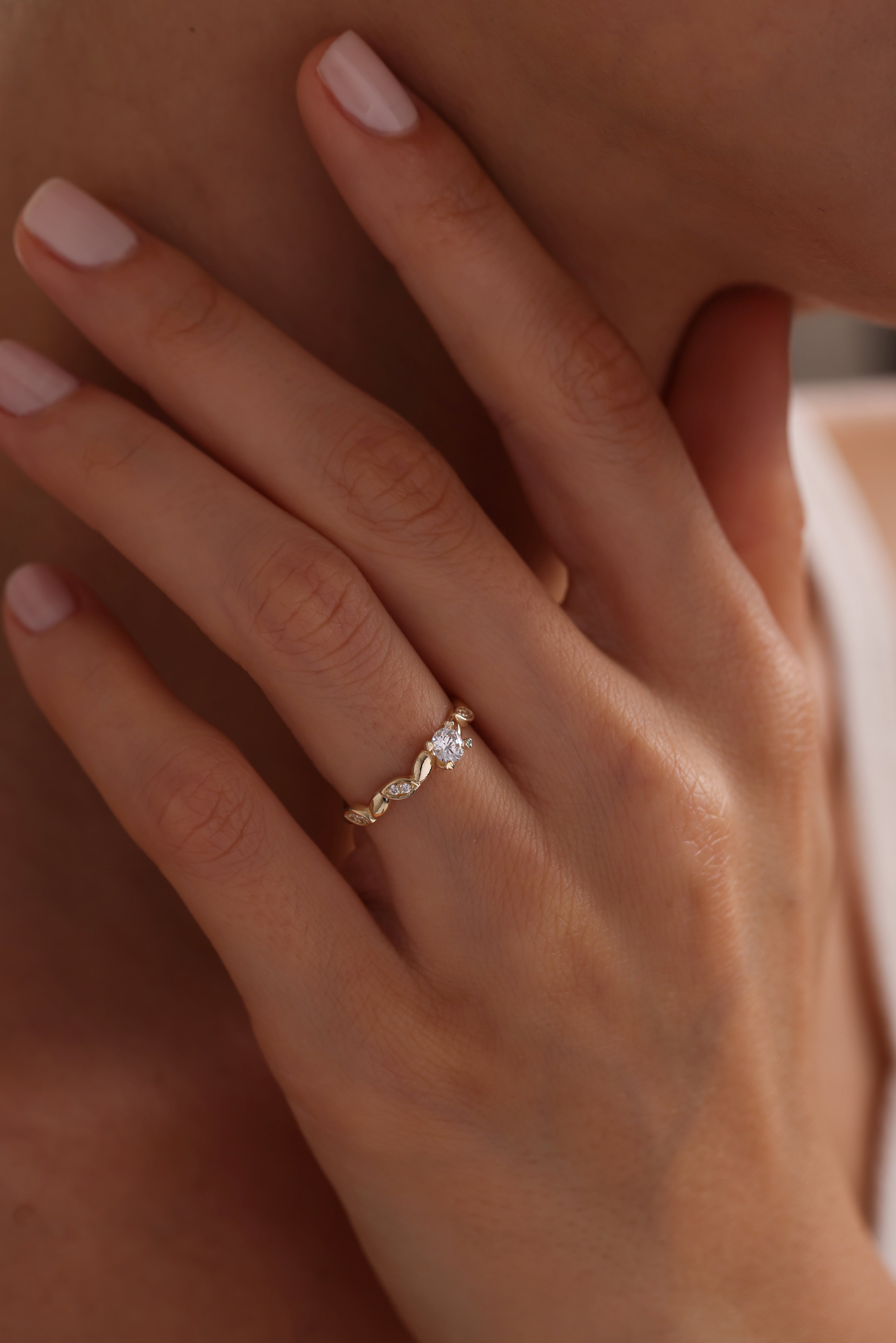 14k Gold Round Diamond Solitaire Ring with Marquise Accents