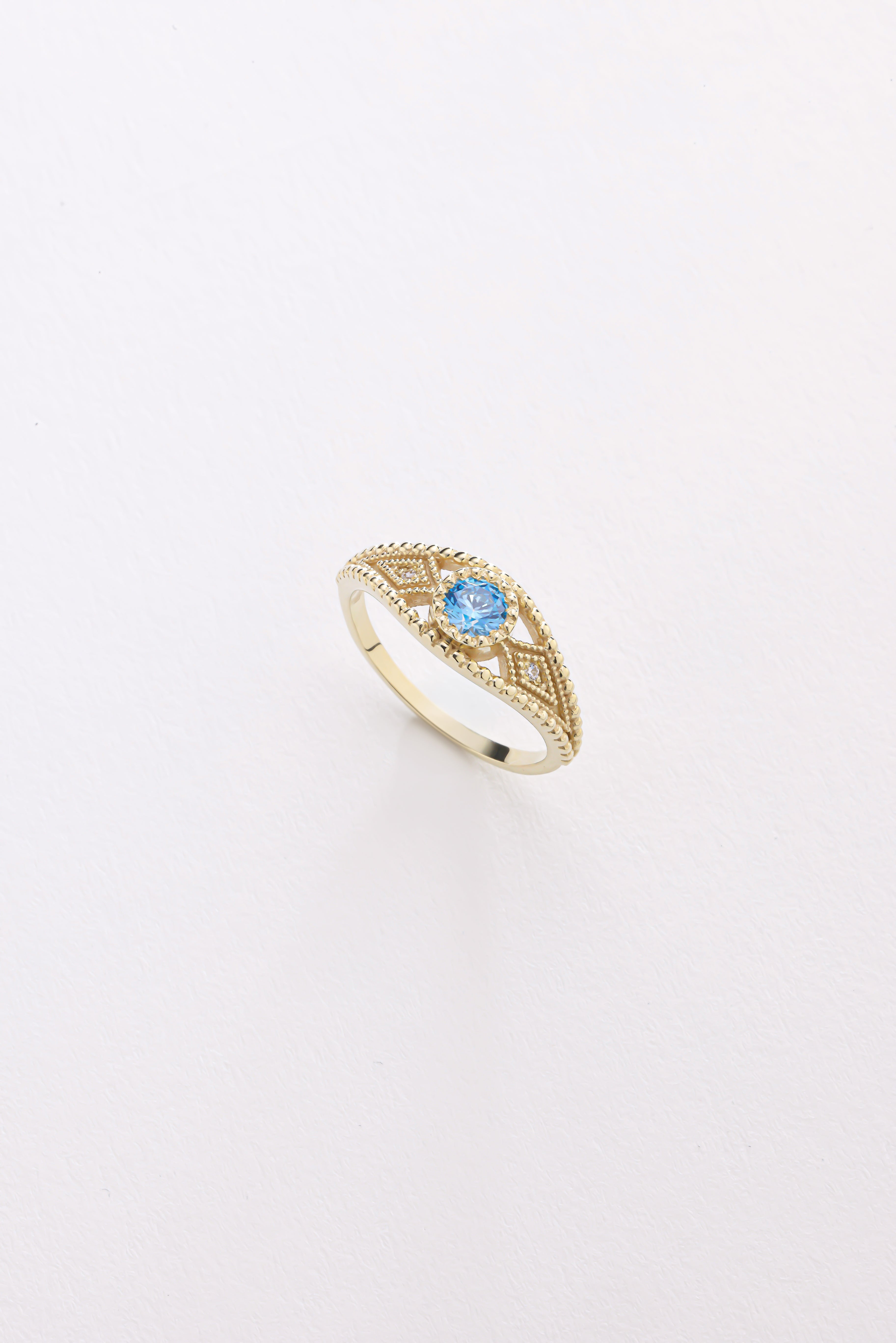 14k Gold Blue Topaz Ring