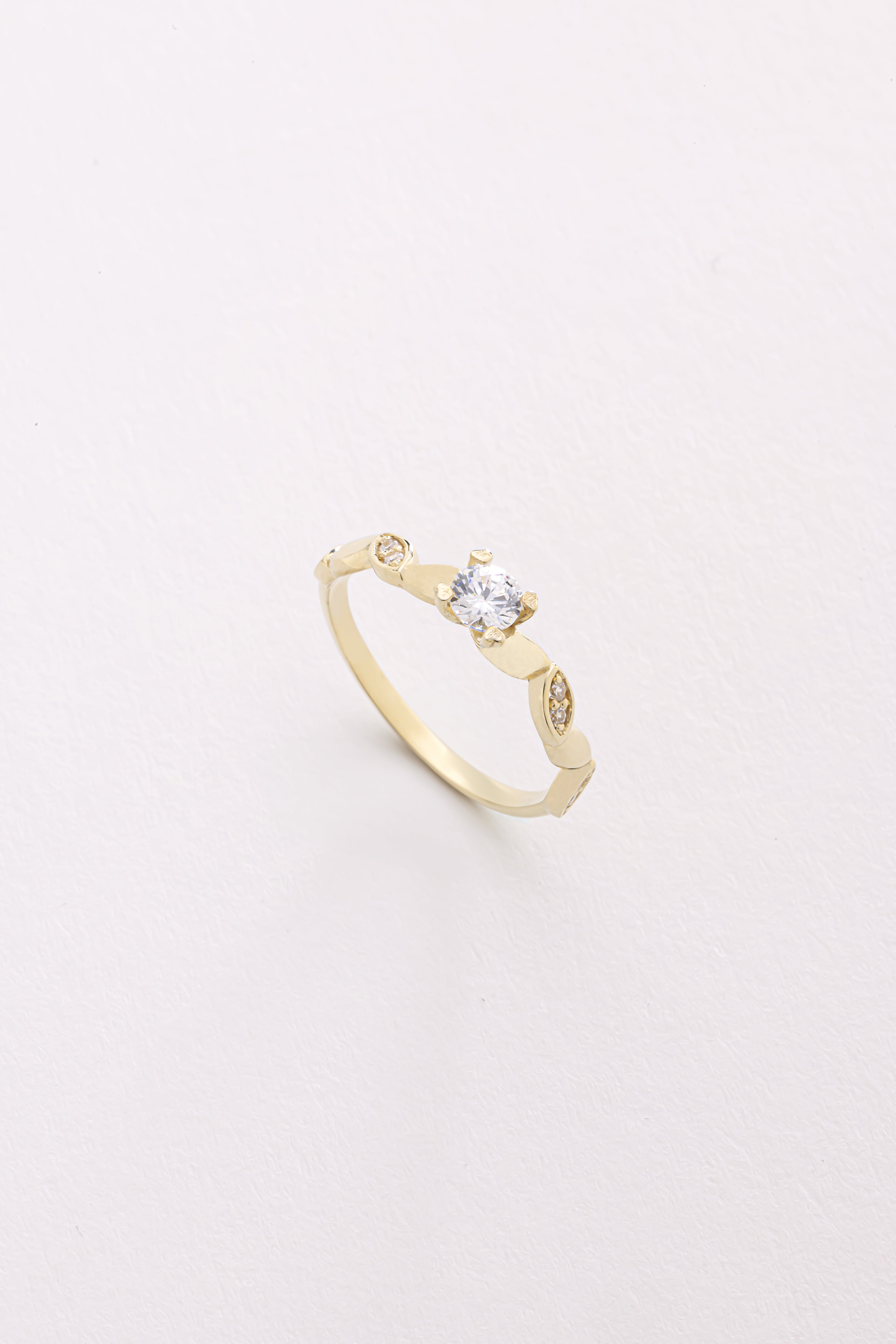 14k Gold Round Diamond Solitaire Ring with Marquise Accents