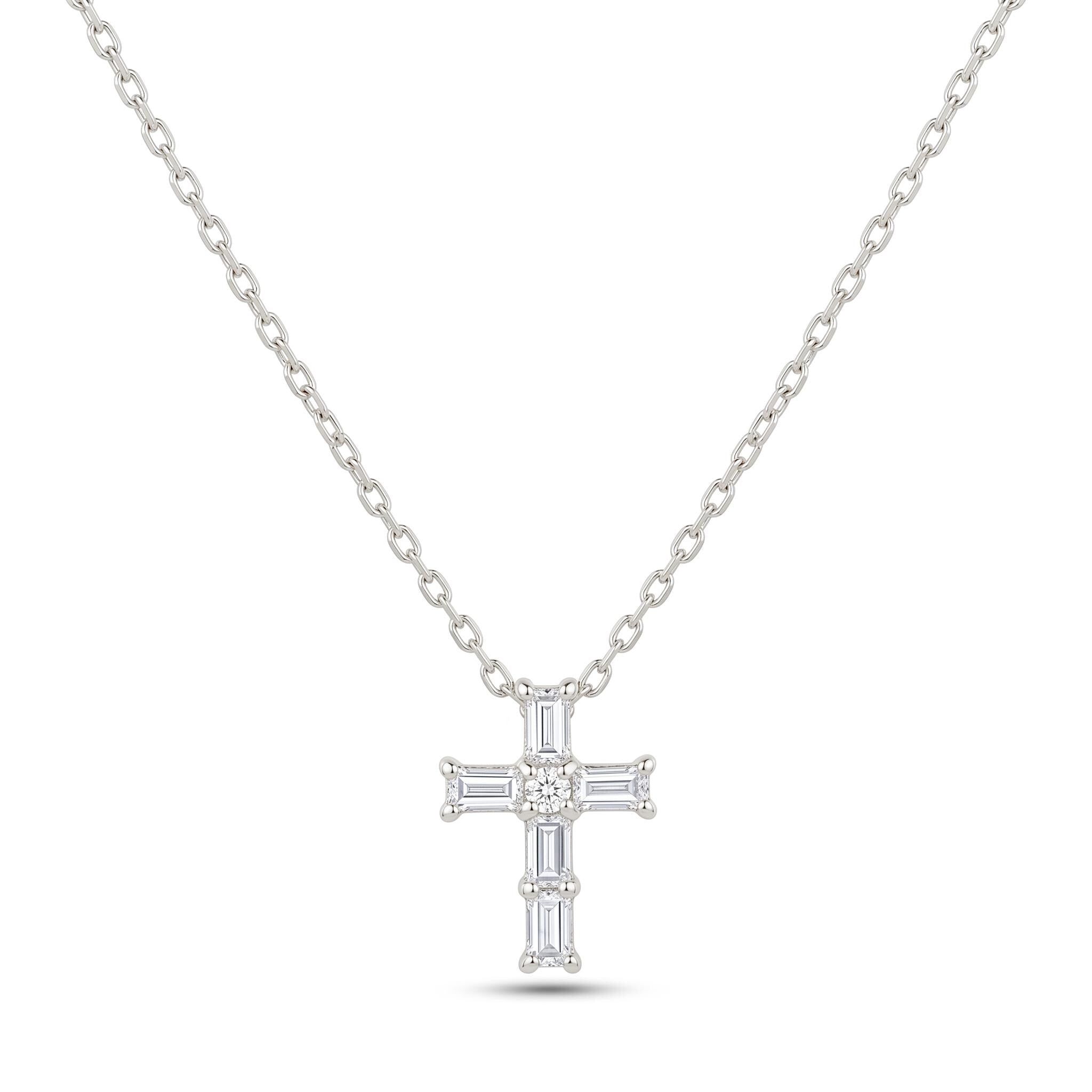 A silver necklace with a cross pendant made of small diamonds.