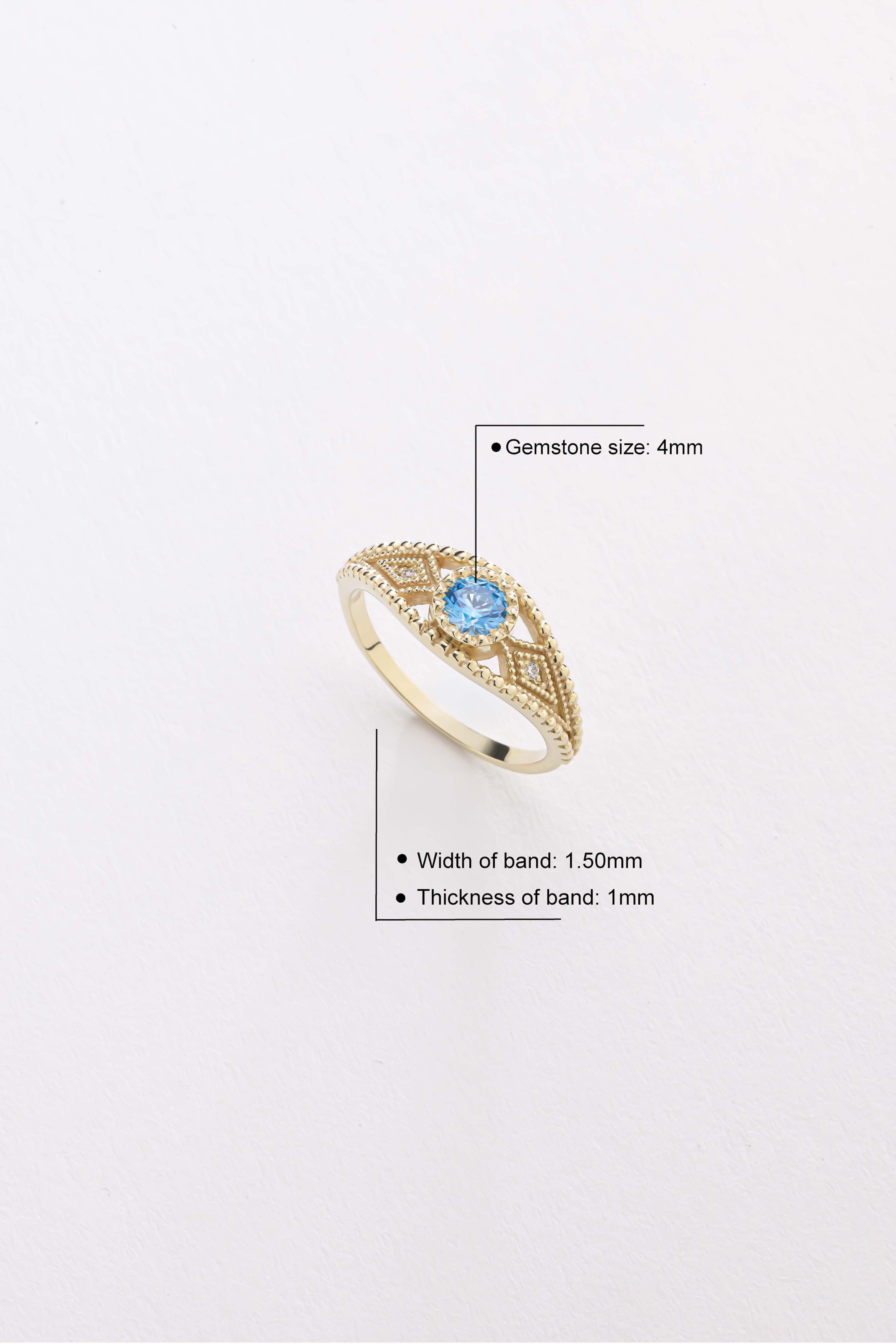 14k Gold Blue Topaz Ring
