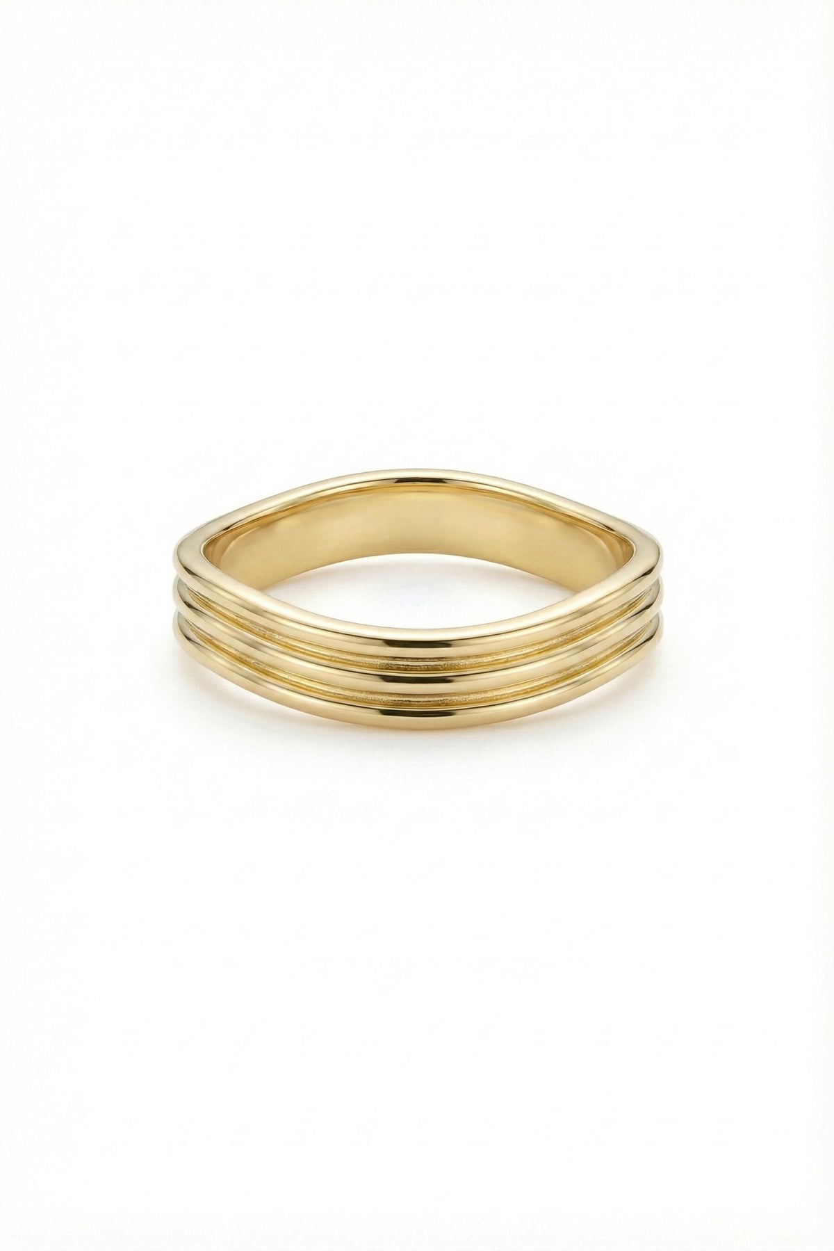 May include: A gold ring with a unique design. The ring features a series of three parallel, horizontal ridges that encircle the band. The ring has a smooth, polished finish and a slightly curved shape, creating a modern and elegant look.