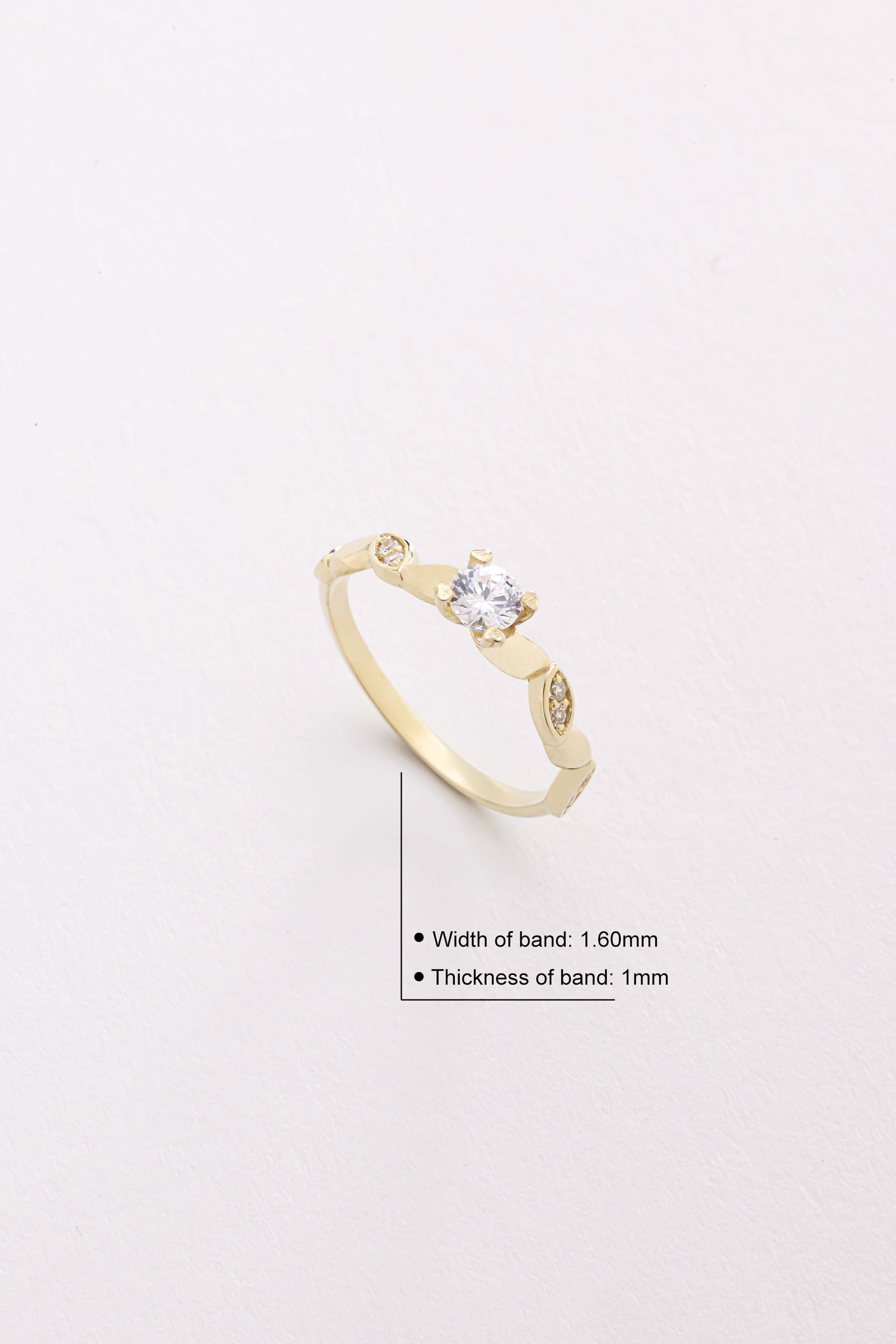 14k Gold Round Diamond Solitaire Ring with Marquise Accents