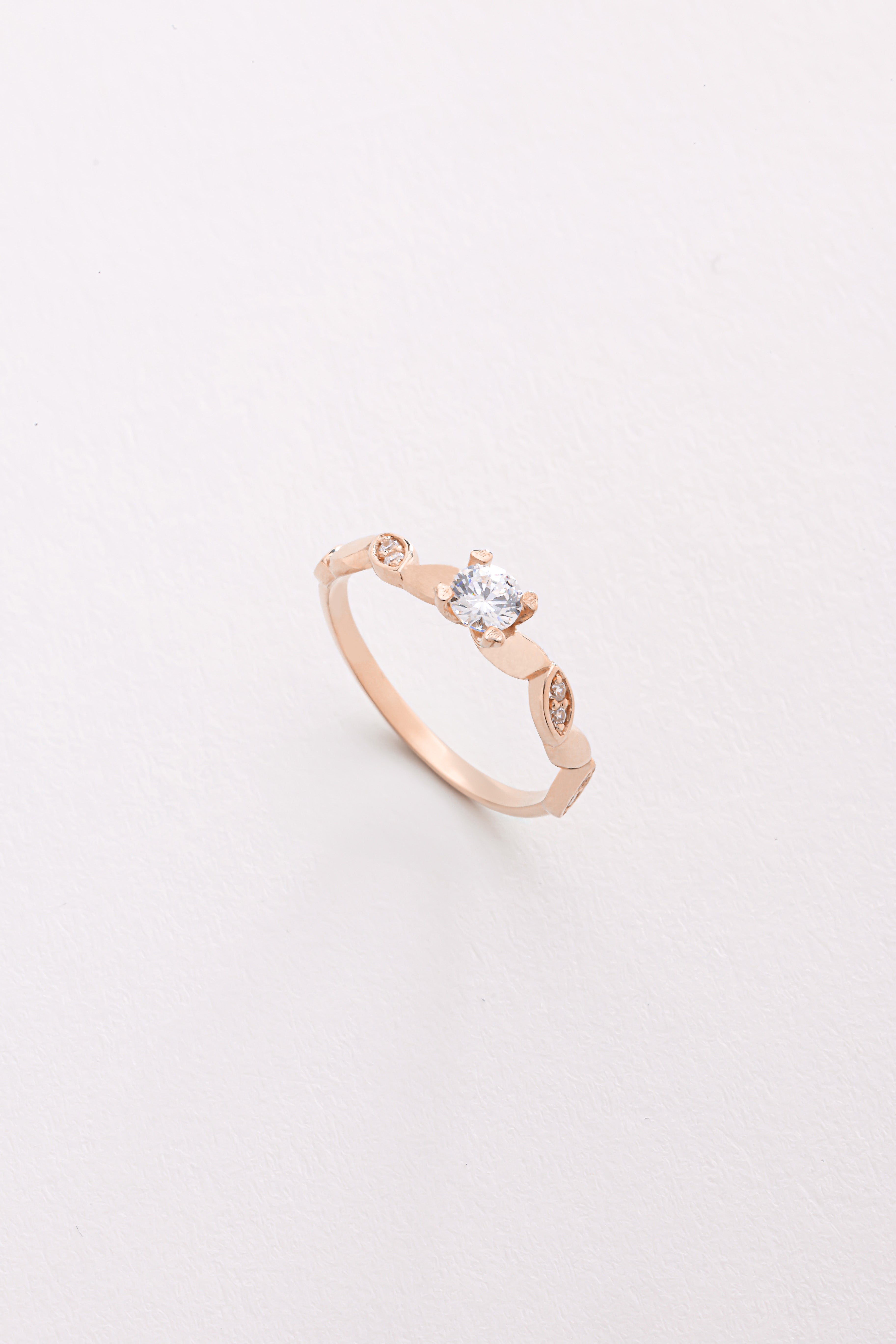 14k Gold Round Diamond Solitaire Ring with Marquise Accents